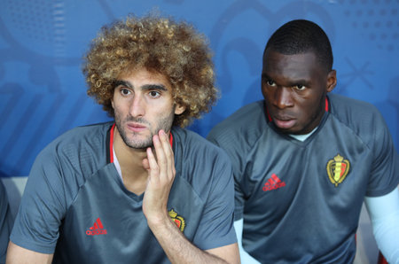 NICE, FRANCE - JUNE 22, 2016: Marouane Fellaini (L) and Jordan Lukaku of Belgium look on before the UEFA EURO 2016 game against Sweden at Allianz Riviera Stade de Nice, City of Nice, Franceのeditorial素材