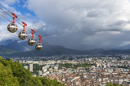 Picturesque aerial view of Grenoble city, France. Grenoble-Bastille cable car on the foreground (French: Telepherique de Grenoble Bastille)の写真素材