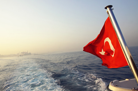 Flag of Turkey on a boat in Bosphorus strait, Istanbul, Turkeyの写真素材
