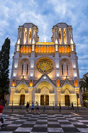 Basilique Notre Dame de Nice in evening. This Roman Catholic Neo-Gothic basilica situated on the Avenue Jean-Medecin in the centre of City of Nice, Franceのeditorial素材