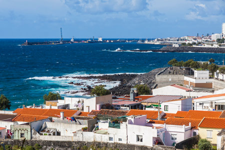 View on Ponta Delgada city and Atlantic ocean coast on Sao Miguel island, Azores, Portugalのeditorial素材