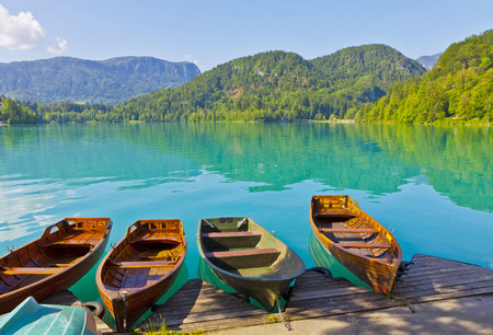 Landscape with boats at the pier of Bled Lake, Bled, Sloveniaの写真素材