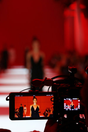 KYIV, UKRAINE - OCTOBER 13, 2016: Televison Camera Broadcasting a Fashion show by Yana CHERVINSKA as part of Spring/Summer 2017 presentation during 39th Ukrainian Fashion Week at Mystetskyi Arsenalのeditorial素材