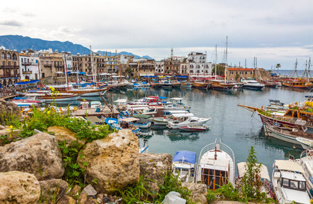 KYRENIA, CYPRUS - JANUARY 19, 2015: Winter view of Kyrenia old harbour in Northern Cyprus. Kyrenia (Turkish: Girne) is a city on the northern coast of Cyprus, noted for its historic harbour and castleのeditorial素材