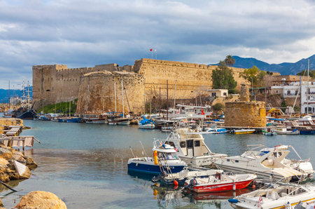 KYRENIA, CYPRUS - JANUARY 19, 2015: Old harbour and Kyrenia castle (Girne Kalesi), Northern Cyprus. Kyrenia is a city on the northern coast of Cyprus, noted for its historic harbour and castleのeditorial素材