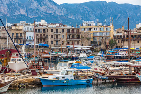 KYRENIA, CYPRUS - JANUARY 19, 2015: Winter view of Kyrenia old harbour in Northern Cyprus. Kyrenia (Turkish: Girne) is a city on the northern coast of Cyprus, noted for its historic harbour and castleのeditorial素材