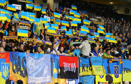MARIBOR, SLOVENIA - NOVEMBER 17, 2015: Ukrainian supporters show their support during UEFA EURO 2016 Play-off for Final Tournament game Slovenia v Ukraine at Stadion Ljudski vrt in Maribor, Sloveniaのeditorial素材