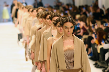 KYIV, UKRAINE - FEBRUARY 7, 2017: Models present a creation by designer Maryna RYBALKO during 40th Ukrainian Fashion Week season Autumn/Winter 2017/18 at Mystetskyi Arsenal in Kyiv, Ukraineのeditorial素材