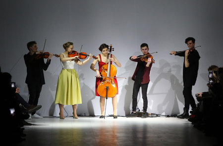KYIV, UKRAINE - FEBRUARY 7, 2017: Artists perform on catwalk during the presentation of collection by designer Maryna RYBALKO as part of 40th Ukrainian Fashion Week season AW 2017/18 in Kyiv, Ukraineのeditorial素材