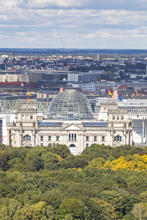 Large glass dome on the roof of German parliament building (Deutscher Bundestag or Reichstag) in Berlin, Germanyの写真素材