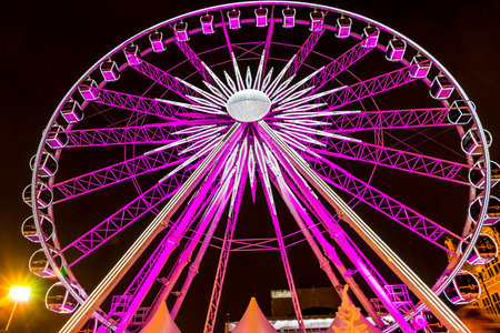 GDANSK, POLAND - DECEMBER 3, 2016: Illuminated Ferris wheel at Annual traditional Christmas fair on Targ Weglowy (Coal Market) in center of Gdansk city, Polandのeditorial素材