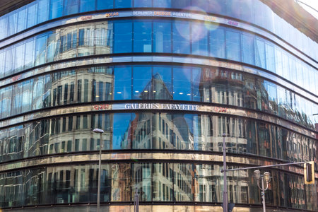 BERLIN, GERMANY - SEPTEMBER 17, 2017: City architecture reflected in glass facade windows of Galeries Lafayette Berlin building. This building of French architect Jean Nouvel is also called Quartier 207のeditorial素材