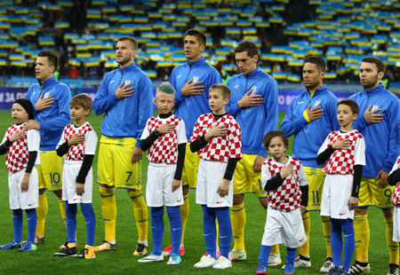 KYIV, UKRAINE - OCTOBER 9, 2017: Ukrainian players listen to national anthem before the FIFA World Cup 2018 qualifying game against Croatia at NSC Olimpiyskyi stadium in Kyiv, Ukraineのeditorial素材