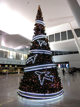 WROCLAW, POLAND - DECEMBER 9, 2017: New Year's Tree decorated with airplanes at the departure hall of Wroclaw Airport (WRO) in Polandのeditorial素材