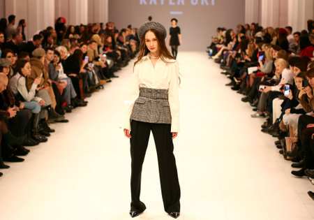 KYIV, UKRAINE - FEBRUARY 7, 2018: Model presents a creation by designer Katea GRI during 42nd Ukrainian Fashion Week season Fall/Winter 2018/19 at Mystetskyi Arsenal in Kyiv, Ukraineのeditorial素材