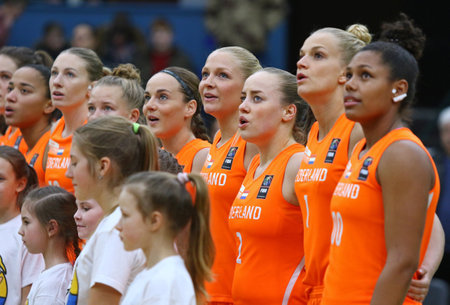 KYIV, UKRAINE - FEBRUARY 14, 2018: Players of National Team of Netherlands listen to National anthems before the FIBA Womens EuroBasket 2019 game Ukraine v Netherlands at Palace of Sports in Kyivのeditorial素材