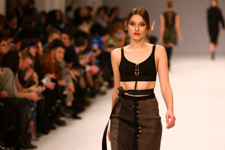 KYIV, UKRAINE - FEBRUARY 3, 2018: Models present a creation by designer DOMANOF during 42nd Ukrainian Fashion Week season Fall/Winter 2018/19 at Mystetskyi Arsenal in Kyiv, Ukraineのeditorial素材