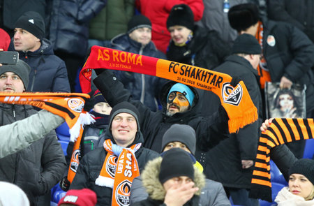 KHARKIV, UKRAINE - FEBRUARY 21, 2018: Shakhtar Donetsk supporters show their support during UEFA Champions League Round of 16 game against AS Roma at OSK Metalist stadium in Kharkiv, Ukraineのeditorial素材