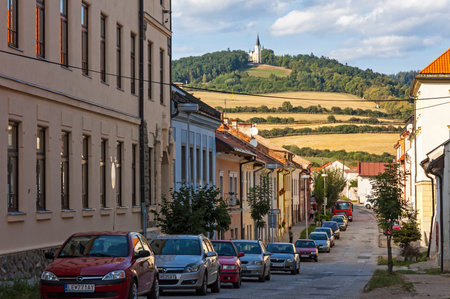 Levoca, Slovakia - August 26, 2015: Bastova street in Levoca city, Slovakia. Basilica of the Visitation of the Blessed Virgin Mary on top of Marianska hora hill on the backgroundのeditorial素材