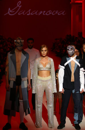 KYIV, UKRAINE - FEBRUARY 3, 2018: Models present a creation by designer GASANOVA during 42nd Ukrainian Fashion Week season Fall/Winter 2018/19 at Mystetskyi Arsenal in Kyiv, Ukraineのeditorial素材