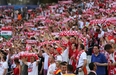 MARSEILLE, FRANCE - JUNE 21, 2016: Polish fans show their support during the UEFA EURO 2016 game Ukraine v Poland at Stade Velodrome in Marseille. Poland won 1-0のeditorial素材