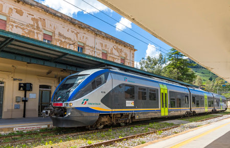 ENNA, ITALY - MAY 9, 2018: Train arrives to Enna railway station (Stazione di Enna), small railway station situated in 5km away well below the Enna old town, Sicily, Italyのeditorial素材
