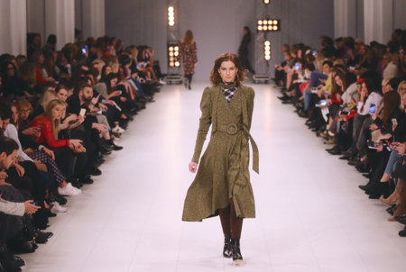 KYIV, UKRAINE - FEBRUARY 3, 2018: Models present a creation by designer Nadya DZYAK during 42nd Ukrainian Fashion Week season Fall/Winter 2018/19 at Mystetskyi Arsenal in Kyiv, Ukraineのeditorial素材
