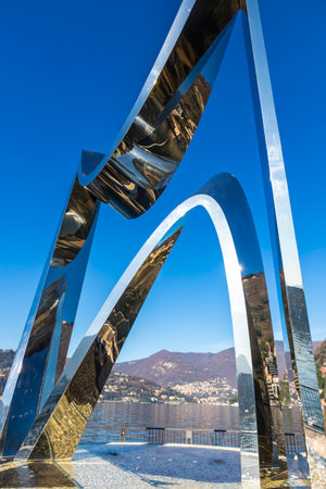 COMO, ITALY - DECEMBER 2, 2016: View of Stainless steel sculpture Life Electric created by Daniel Libeskind situated on Lake Como in Como city, Lombardy, Italyのeditorial素材