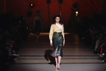 KYIV, UKRAINE - FEBRUARY 3, 2018: Models present a creation The COAT by designer Katya Silchenko during 42nd Ukrainian Fashion Week season Fall/Winter 2018/19 at Mystetskyi Arsenal in Kyiv, Ukraineのeditorial素材