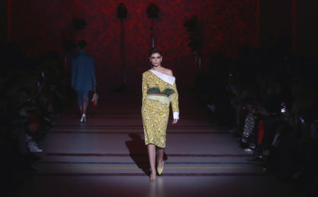 KYIV, UKRAINE - FEBRUARY 3, 2018: Models present a creation The COAT by designer Katya Silchenko during 42nd Ukrainian Fashion Week season Fall/Winter 2018/19 at Mystetskyi Arsenal in Kyiv, Ukraineのeditorial素材