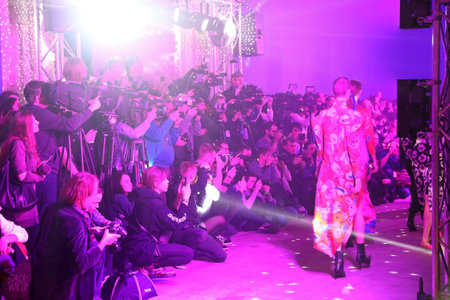 KYIV, UKRAINE - FEBRUARY 3, 2018: Photographers at work during the fashion presentation by POUSTOVIT as part of 42nd Ukrainian Fashion Week at Mystetskyi Arsenal in Kyiv, Ukraineのeditorial素材
