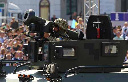 KYIV, UKRAINE - AUGUST 24, 2018: Ukrainian army soldier holds US Javelin portable anti-tank weapon,...
