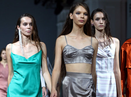 KYIV, UKRAINE - SEPTEMBER 3, 2018: Models present a creation by designer ARUTIUNOVA during Ukrainian Fashion Week Spring/Summer 2019 at Mystetskyi Arsenal in Kyiv, Ukraineのeditorial素材