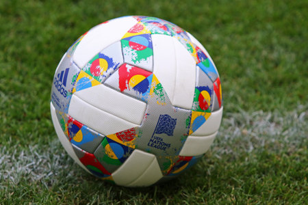 KYIV, UKRAINE - SEPTEMBER 4, 2018: Adidas Nations League, official match ball of UEFA Nations League 2018/2019 on the grass. Ball has colorful design elements inspired by official Nations League flagのeditorial素材