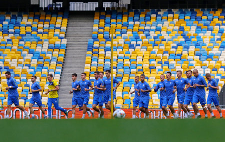 KYIV, UKRAINE - SEPTEMBER 4, 2018: Players run during Open training session of Ukraine National Football Team at NSC Olimpiyskyi stadium in Kyiv, Ukraineのeditorial素材