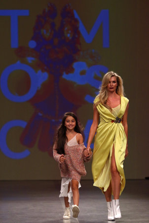 KYIV, UKRAINE - SEPTEMBER 3, 2018: Models present a creation by designer T.MOSCA during Ukrainian Fashion Week Spring/Summer 2019 at Mystetskyi Arsenal in Kyiv, Ukraineのeditorial素材
