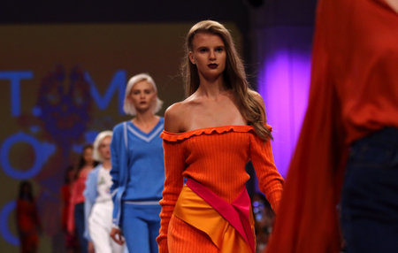 KYIV, UKRAINE - SEPTEMBER 3, 2018: Models present a creation by designer T.MOSCA during Ukrainian Fashion Week Spring/Summer 2019 at Mystetskyi Arsenal in Kyiv, Ukraineのeditorial素材