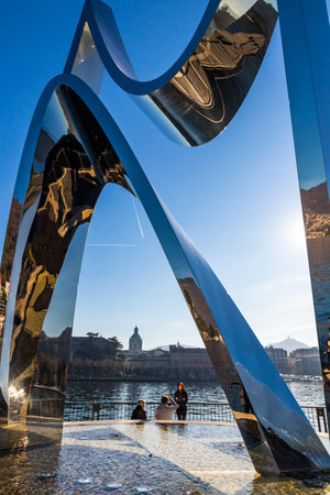 COMO, ITALY - DECEMBER 2, 2016: View of Stainless steel sculpture Life Electric created by Daniel Libeskind situated on the Lake Como in Como city, Lombardy, Italyのeditorial素材