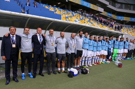 LVIV, UKRAINE - SEPTEMBER 9, 2018: Slovak coaches and bench players listen to the National Anthem before the UEFA Nations League game Ukraine v Slovakia at Arena Lviv stadium in Lviv, Ukraineのeditorial素材