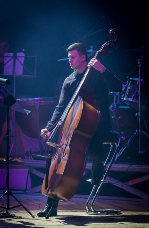 KYIV, UKRAINE - NOVEMBER 22, 2018: Musicians of Symphony Orchestra (conductor Andrey Chernyi) perform on stage during "The Game of Thrones" concert at National Palace of Arts "Ukraina" in Kyivのeditorial素材