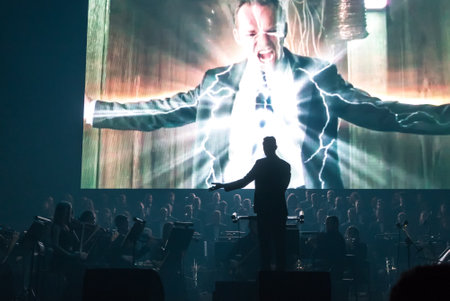 KYIV, UKRAINE - NOVEMBER 22, 2018: Symphony Orchestra (conductor Andrey Chernyi) and Choir "Voice of the Sympho Rock" perform soundtracks from "The Game of Thrones" on stage of National Palace of Artsのeditorial素材