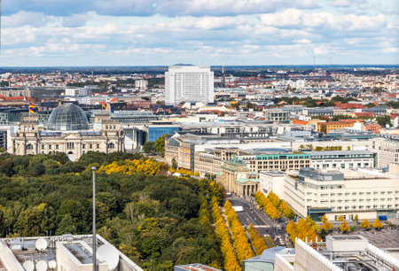 Reichstag (Bundestag) building (on the left) and Brandenburger Tor (Brandenburg Gate) (in center). One of the famost landmarks of Berlin, Germany. Aerial viewのeditorial素材