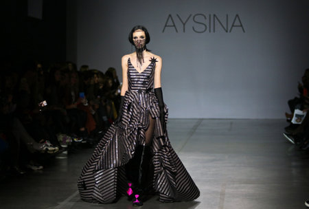 KYIV, UKRAINE - FEBRUARY 3, 2019: Model presents a creation by designer Julia AYSINA during 44th Ukrainian Fashion Week season Fall/Winter 2019/20 at Mystetskyi Arsenal in Kyiv, Ukraineのeditorial素材