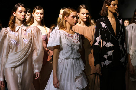 KYIV, UKRAINE - FEBRUARY 5, 2019: Models present a creation by designer DARJA DONEZZ during 44th Ukrainian Fashion Week season Fall/Winter 2019/20 at Mystetskyi Arsenal in Kyiv, Ukraineのeditorial素材
