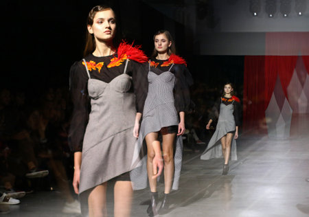 KYIV, UKRAINE - FEBRUARY 5, 2019: Model presents a creation by designer DARJA DONEZZ during Ukrainian Fashion Week FW19-20 at Mystetskyi Arsenal in Kyiv. Multiple exposure photography techniqueのeditorial素材