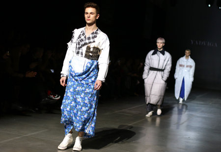 KYIV, UKRAINE - FEBRUARY 5, 2019: Models present a creation by designer YADVIGA NETYKSHA during 44th Ukrainian Fashion Week season Fall/Winter 2019/20 at Mystetskyi Arsenal in Kyiv, Ukraineのeditorial素材
