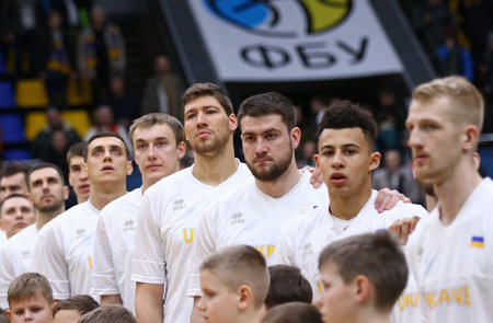KYIV, UKRAINE - FEBRUARY 22, 2019: Players of National Team of Ukraine listen to National anthem before FIBA World Cup 2019 European Qualifiers game against Montenegro at Palace of Sports in Kyivのeditorial素材