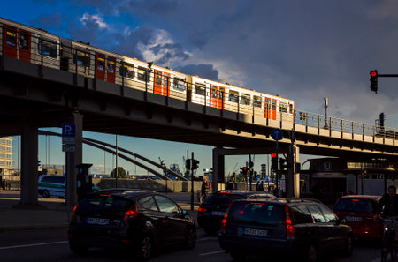 Hamburg, Germany - June 25, 2014: U-Bahn train moves on the Binnenhafenbrucke bridge in Hamburg city. Hamburg U-Bahn is a rapid transit system serving the cities of Hamburg, Norderstedt and Ahrensburgのeditorial素材