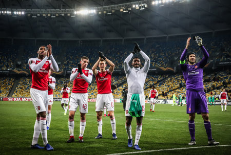 KYIV, UKRAINE - NOVEMBER 29, 2018: Arsenal players tnank their supporters after the UEFA Europa League game against Vorskla Poltava at NSC Olimpiyskyi stadium in Kyiv, Ukraine. Arsenal won 3-0のeditorial素材