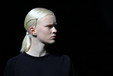 KYIV, UKRAINE - FEBRUARY 5, 2019: Profile portrait of blonde model seen during the fashion presentation KO by KOLOTIY as part of 44th Ukrainian Fashion Week season Fall/Winter 2019/20 in Kyivのeditorial素材